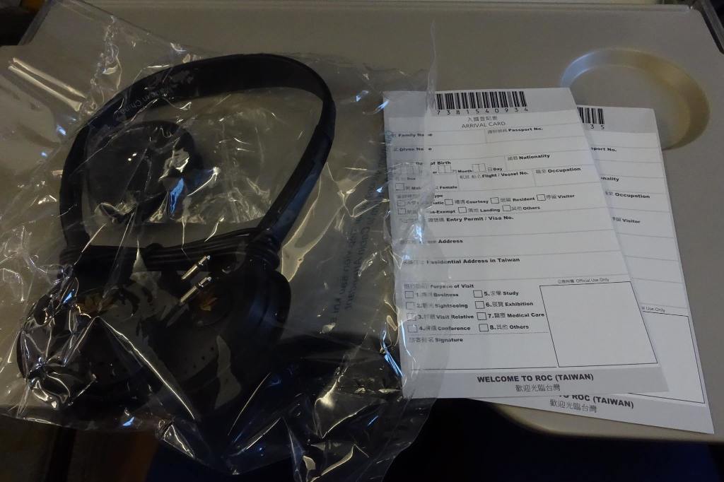 photo 1815a DSC03080 Headphones and Arrival Cards Distributed